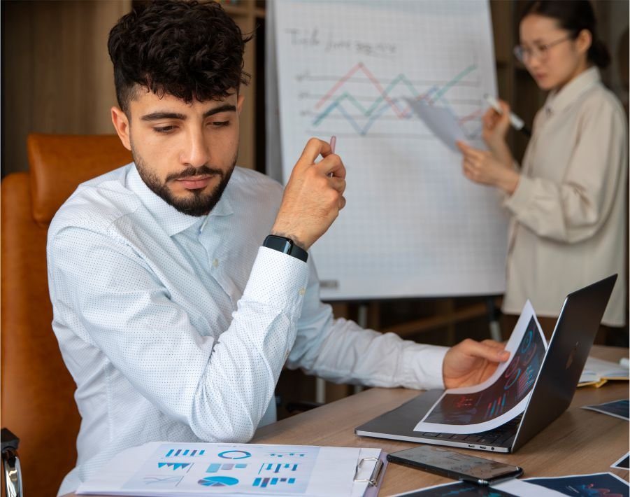office-workers-using-finance-graphs